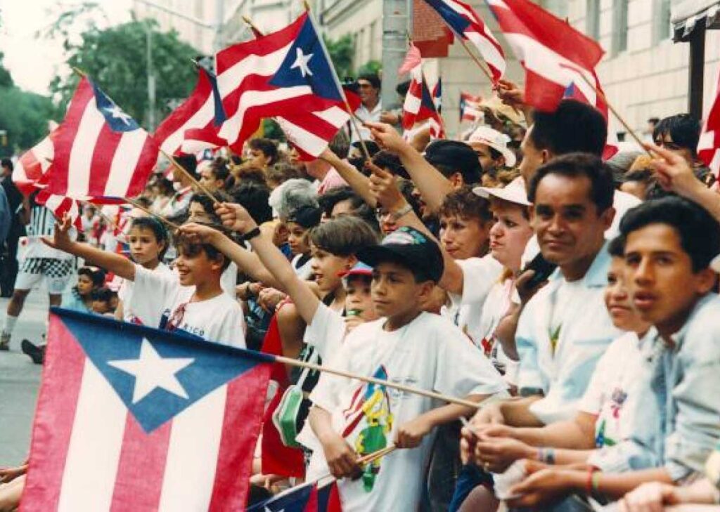 Puerto Rico citizens waving flags